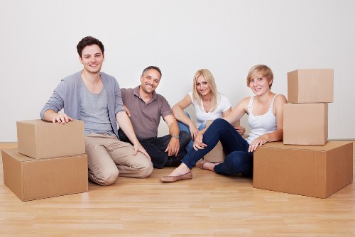 Professional movers handling a compact flat move in Newburypark